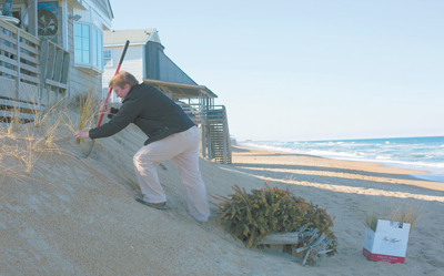 Donnie King working to preserve the beach. Photo K. Wilkins Photography.