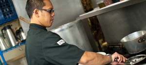 Chef Pok at work in the Brewing Station kitchen. Photo, North Beach Sun.