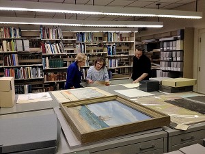 Sec. Kluttz explores the Outer Banks History Center’s collections with OBHC Site Manager KaeLi Schurr and Archivist Stuart Parks. Photo, N.C. Department of Cultural Resources.