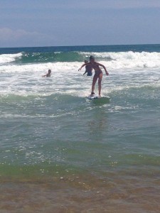 little girl surfing