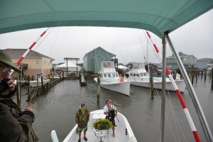 Blessing of the Fleet with a wreathe to commemorate the watermen who have passed away. Photo, Donny Bowers.