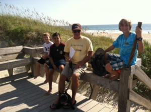Jackson Strange, Edwin Perez, and Julian Bennink joined their Scoutmaster Howard Bennink (and dog Thibeault) at the Beach Sweep