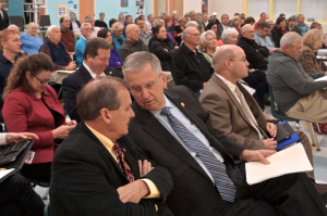 Transportation Board member Malcolm Fearing, foreground, confers with state Rep. Bob Steinburg. District 1 highway engineer Jerry Jennings is to their left. Photo, Russ Lay