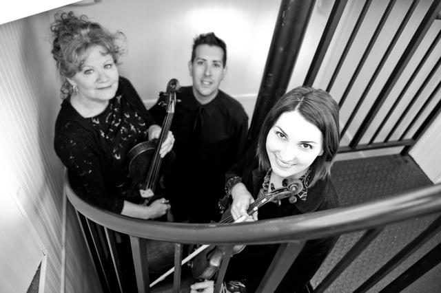 Trio of musicians in a lighthouse
