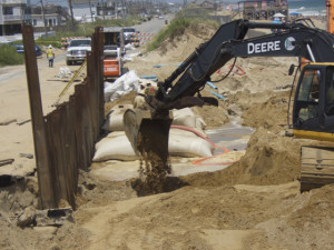 Sandbags and retaining wall, July 2015. Photo, Kip Tabb