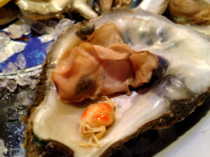 Oyster with pea crab inside. Photo Carolina Foodie.