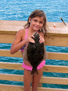 Young angler with her catch at Jennette's Pier. Photo, Jennette's Pier