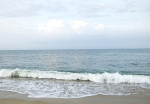 At the beach in Kitty Hawk. Typical small summer waves. Photo Kip Tabb