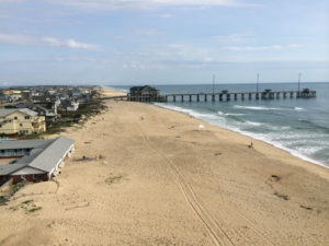 An effective use of beach nourishment. Photo taken 3 years after Nags Head nourishment project. The old high water mark was inside the tire tracks.