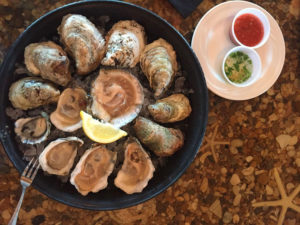 Oysters at Coastal Provisions in Southern Shores. Photo, Virginian Pilot.