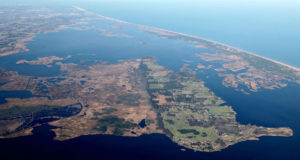 Aerial view of Knotts Island and the northern Currituck Banks. Fan shaped islands on the right side of the image indicate silt deposits after ocean overwash.