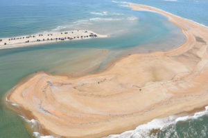 Aerial view of Shelly Island clearly showing the closing of the waters on the back side. Latest report indicate the island is almost attached to The Point.