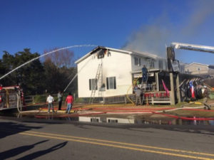 Damaged but still standing. The OVFD saves the Pirate's Chest. Photo Richard Bryant.