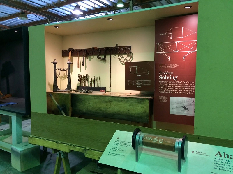 An exhibit case shows a reproduction of the Wright’s bicycle shop before installation. (Formations Inc.)