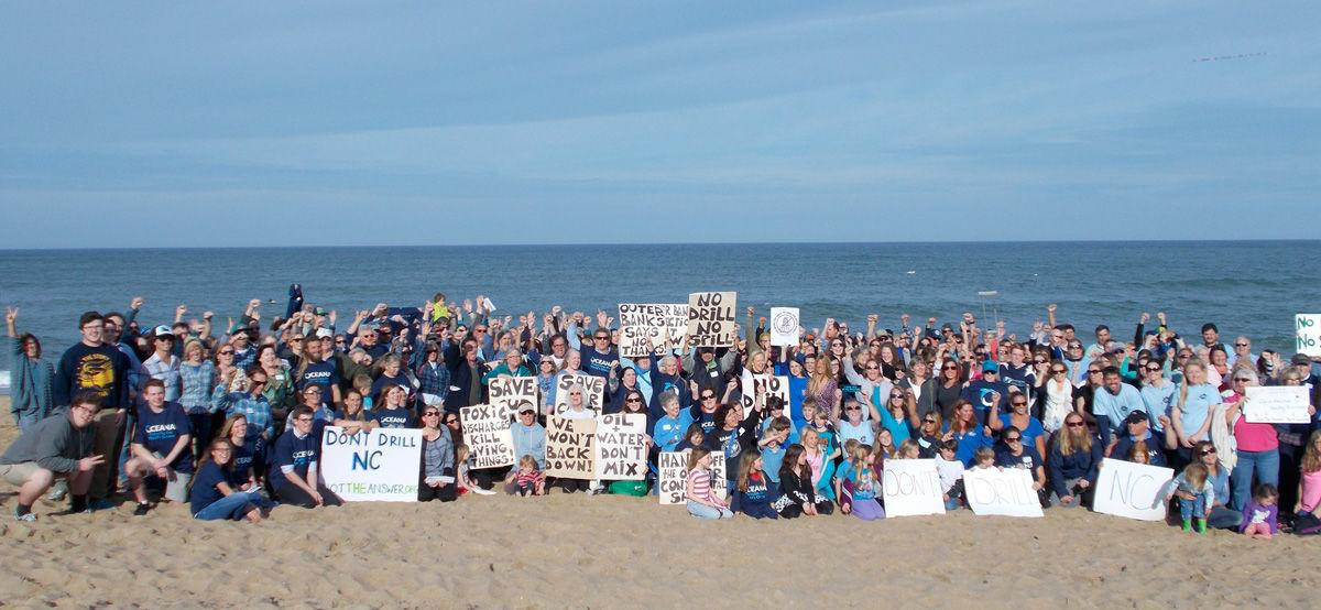 Protester gather in 2015 to voice concerns about the damage offshore drilling could do to the local economy. Photo, Neee Keller, Outer Banks Sentinel