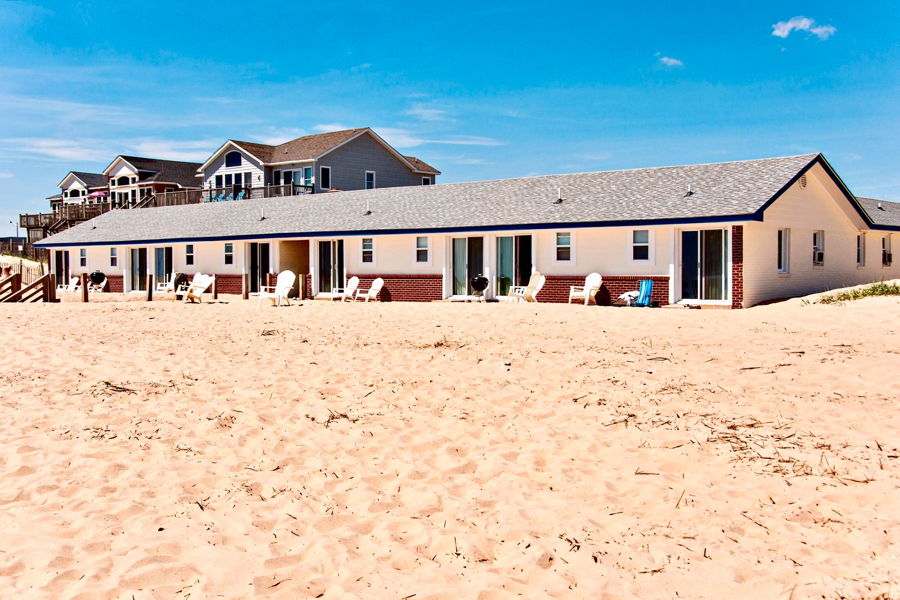 Dolphin Oceanfront Motel. The view from the beach.